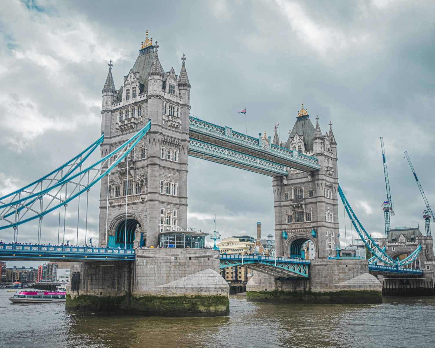 Tower Bridge spanning the River Thames with bascule raised