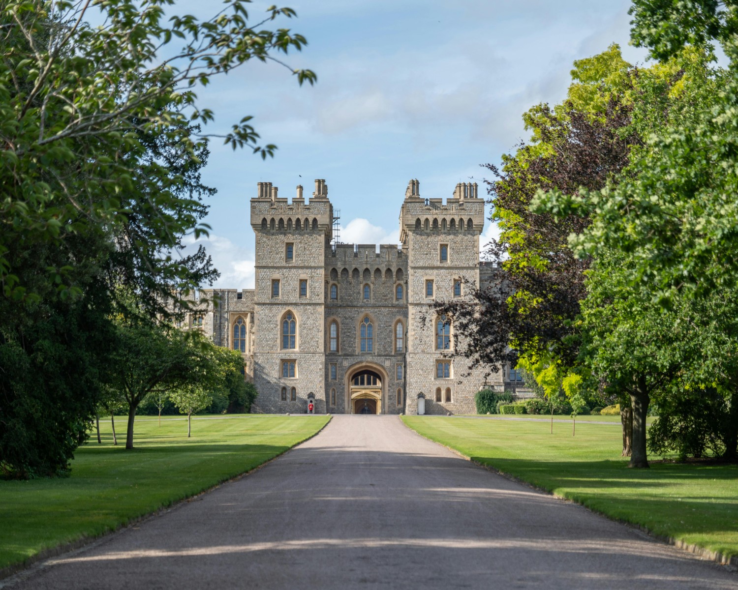 Windsor Castle perched above the Thames with Long Walk approach